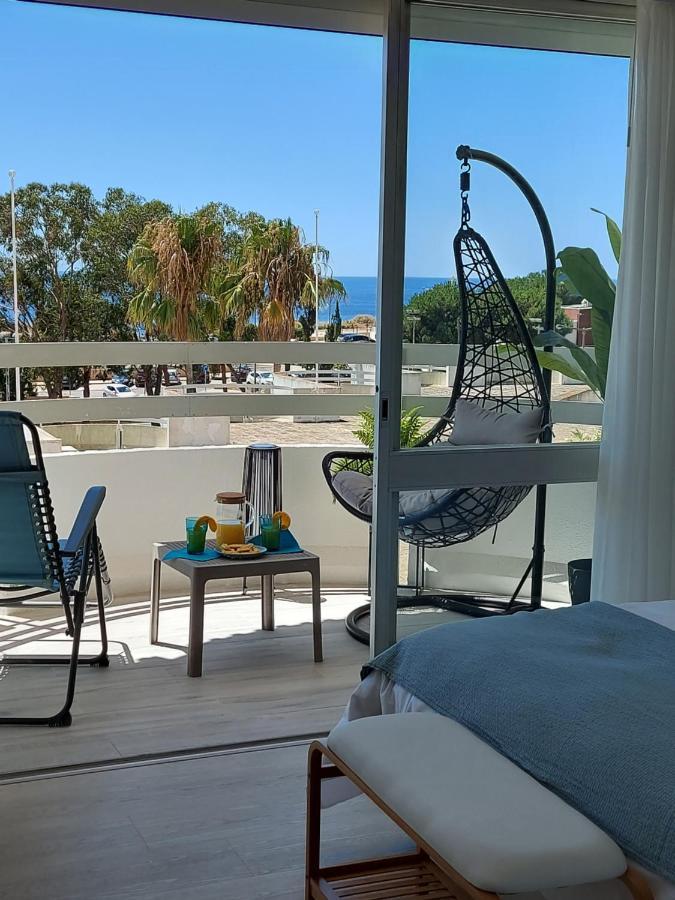 Apartamento em frente à praia com piscina e ténis Portimão Esterno foto