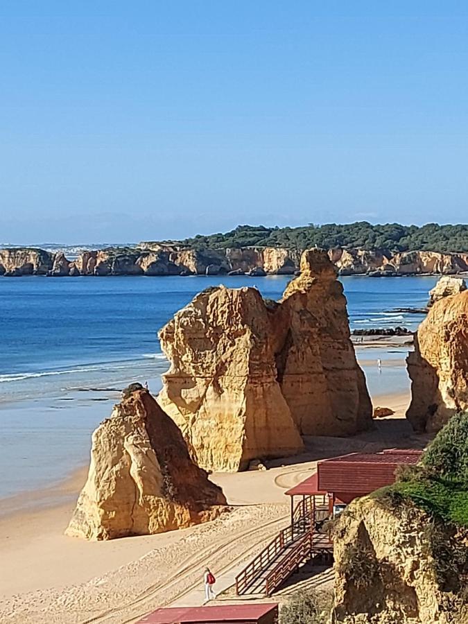 Apartamento em frente à praia com piscina e ténis Portimão Esterno foto